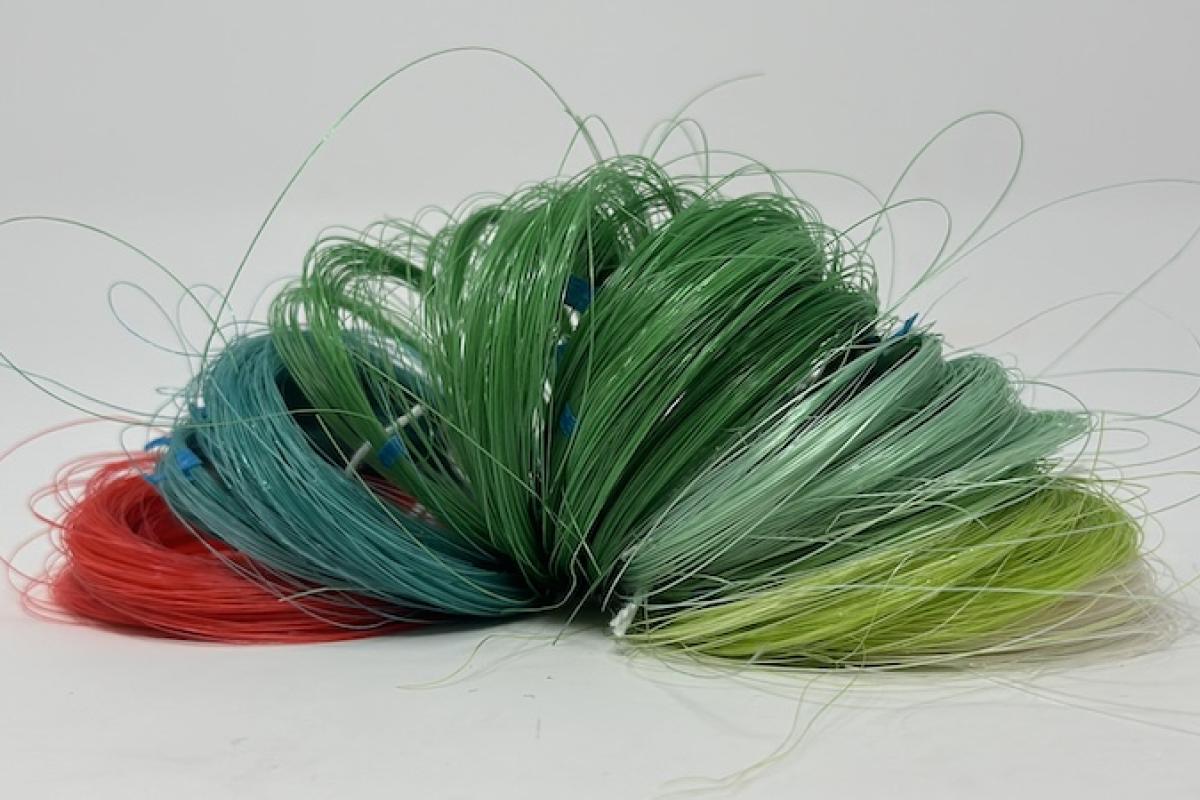 rolls of biofiber threads on many colors