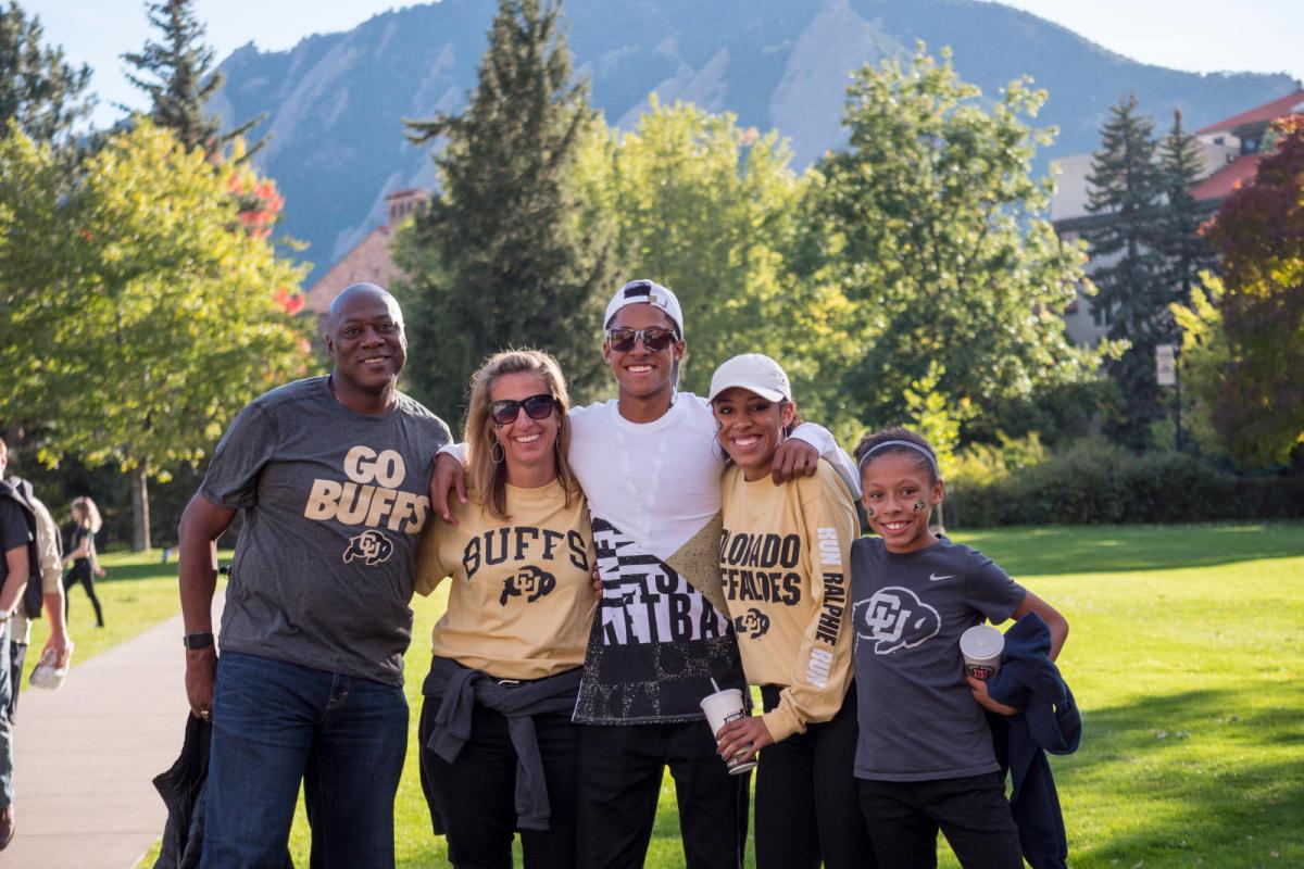 a family at CU Boulder in CU gear
